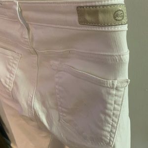 White Skinny Leg Jeans with Fringed Bottoms